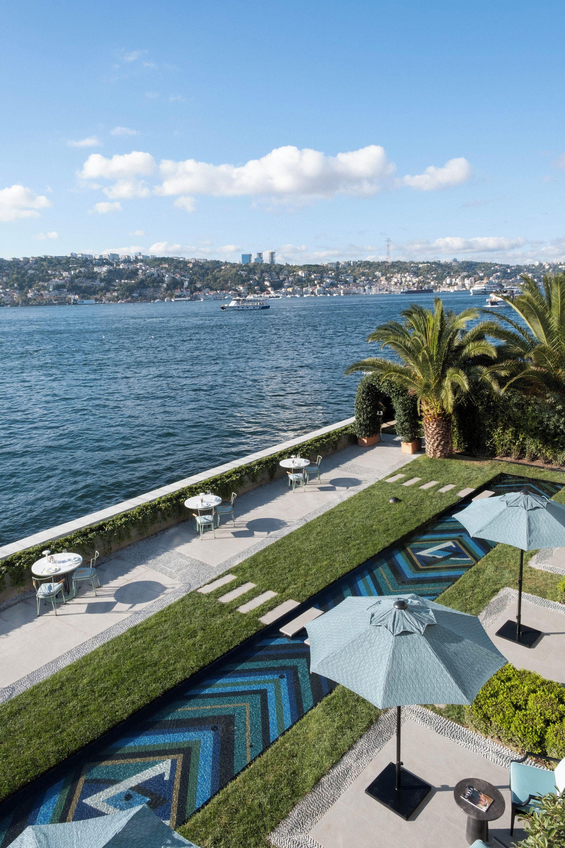 A breathtaking exterior view of Sumahan on the Water on the Asian shores of the Bosphorus, showcasing the converted 19th-century distillery and its private wharf.
